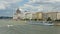 View of the Hungarian Parliament building on the bank of the Danube and a ship in Budapest, Hungary