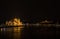 View of Hungarian Parliament Building, Royal Palace and Danube river from Margit bridge at night.