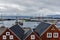 View of the Husavik Port in Nordurting municipality on the North coast of Iceland. Parts of harbor wooden constructions are at