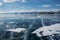 view of ice covered lake water and hills on background, Russia,