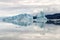 View of an iceberg reflected in the water in Upsala, Argentina