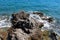 View from Icici`s seaside promenade, the rocky beach,Adriatic coast, Kvarner bay, city details, Croatia