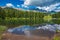 View of idyllic alpine lake in the Pass of San Pellegrino, Trentino, Italy