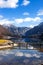 View idyllic Alpine mountains and lake. Sunny winter morning in Hallstatt, Austria, Europe