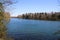 View on idyllic german lake with bare trees in spring on sunny day - BrÃ¼ggen, Venekotensee, Germany
