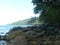 A view of an idyllic rocky beach in the tropics