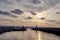 View of Iho Tewoo Beach and two horse shaped lighthouses placed apart from each other on the pier during sunset