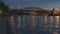 View of illuminated night river ,bridge and the embankment