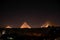 View of the illuminated Pyramids of Giza in Egypt