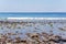 View on Indian ocean coast with pebble and sand beach on Bali, Indonesia