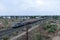 View of Indian Railways trains on the track and nearby electric poles