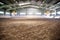 View an indoor riding arena backlight for dressage horses