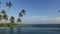 View from infinity edge pool to ocean and palms