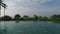 View from infinity edge pool to ocean and palms