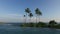 View from infinity edge pool to ocean and palms