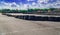 View of the infinity empty asphalt international race track, digital imaging retouch and montage background