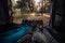 View from inside of group campers lying down in tent with forest background