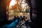 View from inside of group campers lying down in tent with forest background