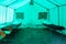 View inside the medical tent of a field hospital for emergencies. Background with selective focus and copy space