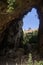 View from inside the natural cave. landscape vista through rocks.