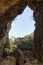 View from inside the natural cave. landscape vista through rocks.