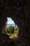 View from inside the natural cave. landscape vista through rocks.