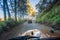 View from the inside of an offroad car riding down the road at the Bromo Tengger Semeru National Park on the Java Island