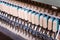 View inside of an old piano, repair and tuning of keyboard musical instruments