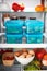 View Inside Refrigerator Of Healthy Food And Packed Lunches In Plastic Containers
