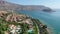 View of the island of Spinalonga with calm sea.