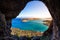 View of the island of Spinalonga with calm sea. Here were isolated lepers, humans with the Hansen`s desease, gulf of Elounda.