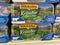 View on isolated packets Milkana soft spread cheese in shelf of german supermarket
