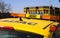 View on isolated yellow rooftop with warning lights of german ADAC service rescue car against blue sky