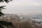 View of Istanbul through branches of trees. Urban landscape on a Cloudy spring day. Travel photography