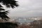 View of Istanbul through branches of trees. Urban landscape on a Cloudy spring day. Travel photography