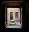 View of the Italian courtyard through the window