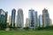 View of Jumeirah Lakes Towers skyscrapers and park.