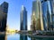 View of Jumeirah Lakes Towers skyscrapers with waterfront. Residential buildings covered with glass in JLT. Jumeirah business cent