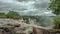 View of the Kalandula waterfalls on Lucala river, tropical forest and cloudy sky as background