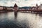 View of the Kappelbrucke wooden bridge and tower on a cloudy day