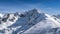 View from Kasprowy Wierch on adventurers climbing on Swinica mountain peak