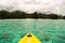 View from kayak on cloudy Rarotonga Island, Cook Islands, Oceania