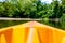 View from kayak towards mountain river rushing waters