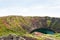 view of Kerid lake in volcanic crater in autumn