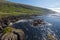 View at Kirkjubour Village from the rocky ocean cost