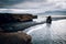 View on Kirkjufjara beach and Arnardrangur cliff. Location Atlantic ocean, Iceland, Europe