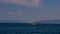 view of kite surfing against blue sky and mountains