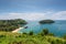 View of the Ko Man island and Yanui Beach from the Windmill Viewpoint - landmark in Phuket, Thailand