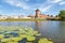 View on Kolomna kremlin wall from river side with lily pads on t