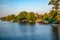 View from the Konka river to the cottage village in the Kherson floodplain Ukraine on a sunny summer evening. Beautiful